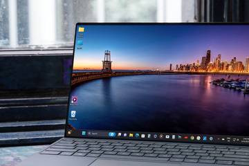 Windows 11 Laptop with a Desktop Wallpaper of a Scenic City