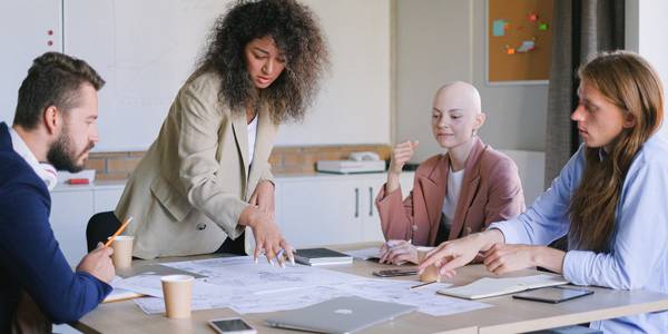 Colleagues brainstorming in a boardroom