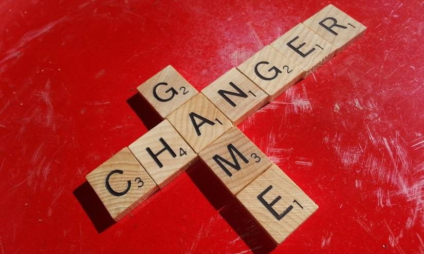 The words Game Changer spelled out in Scrabble tiles 