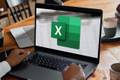 Excel logo displayed on a laptop