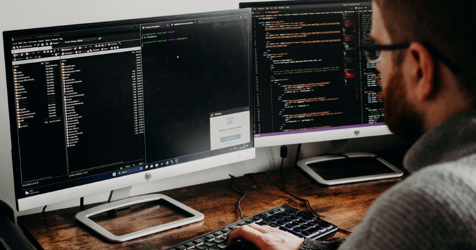 Man Working on Computers Coding