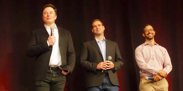 Famous Tech Leaders Elon Musk, J.B. Straubel, and Drew Baglino on Stage