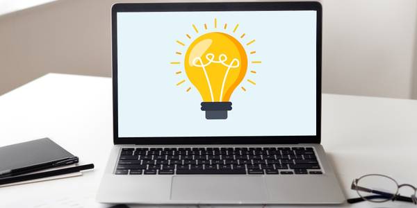 lightbulb against pale blue background on laptop