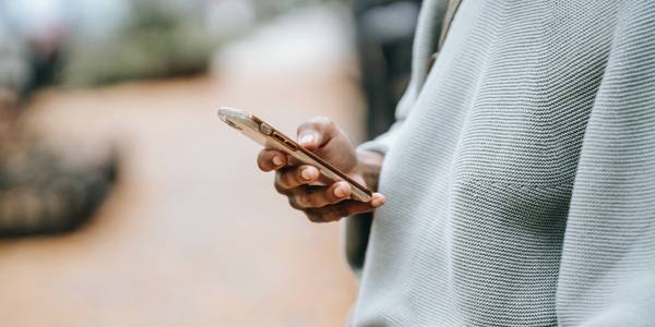 person typing on phone