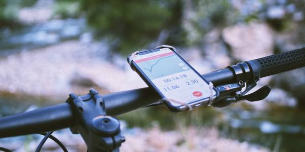 Phone running Strava mounted on a bike