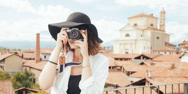 Woman clicking picture on a camera