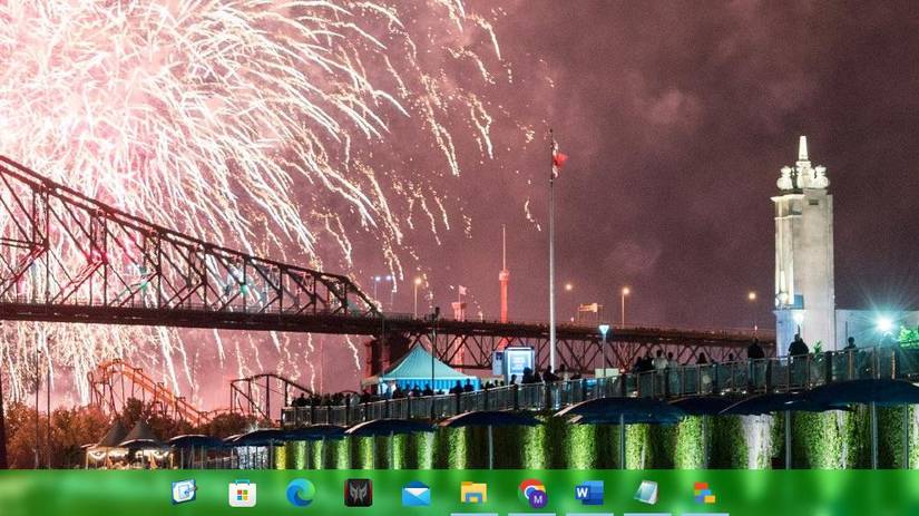 A blurred transparent taskbar with centralized icons