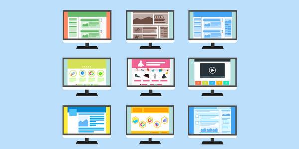 A three-by-three grid illustration of nine monitors, each displaying a colorful wireframe representation of a website