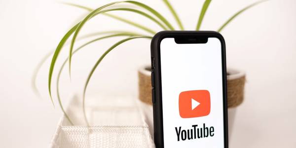 YouTube logo on a smartphone