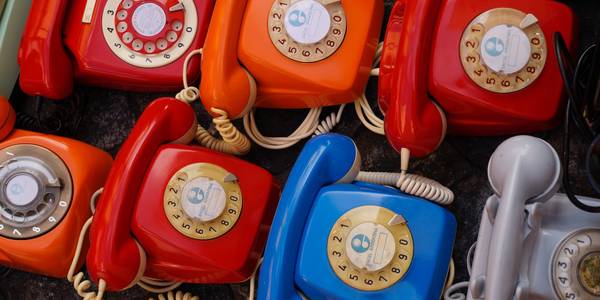 Colorful rotary phones with manual dialers