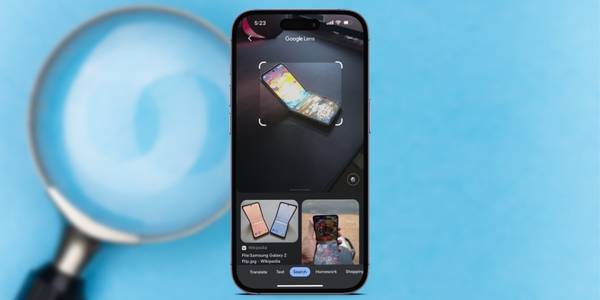 iPhone running Google Lens app in front of a magnifying glass