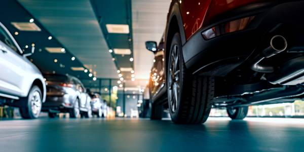 inside of car dealership from underneath car