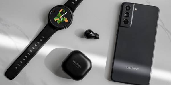 Samsung phone next to Galaxy Buds and Watch