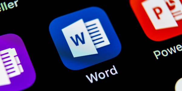 Microsoft word application icon on a black background screen close-up