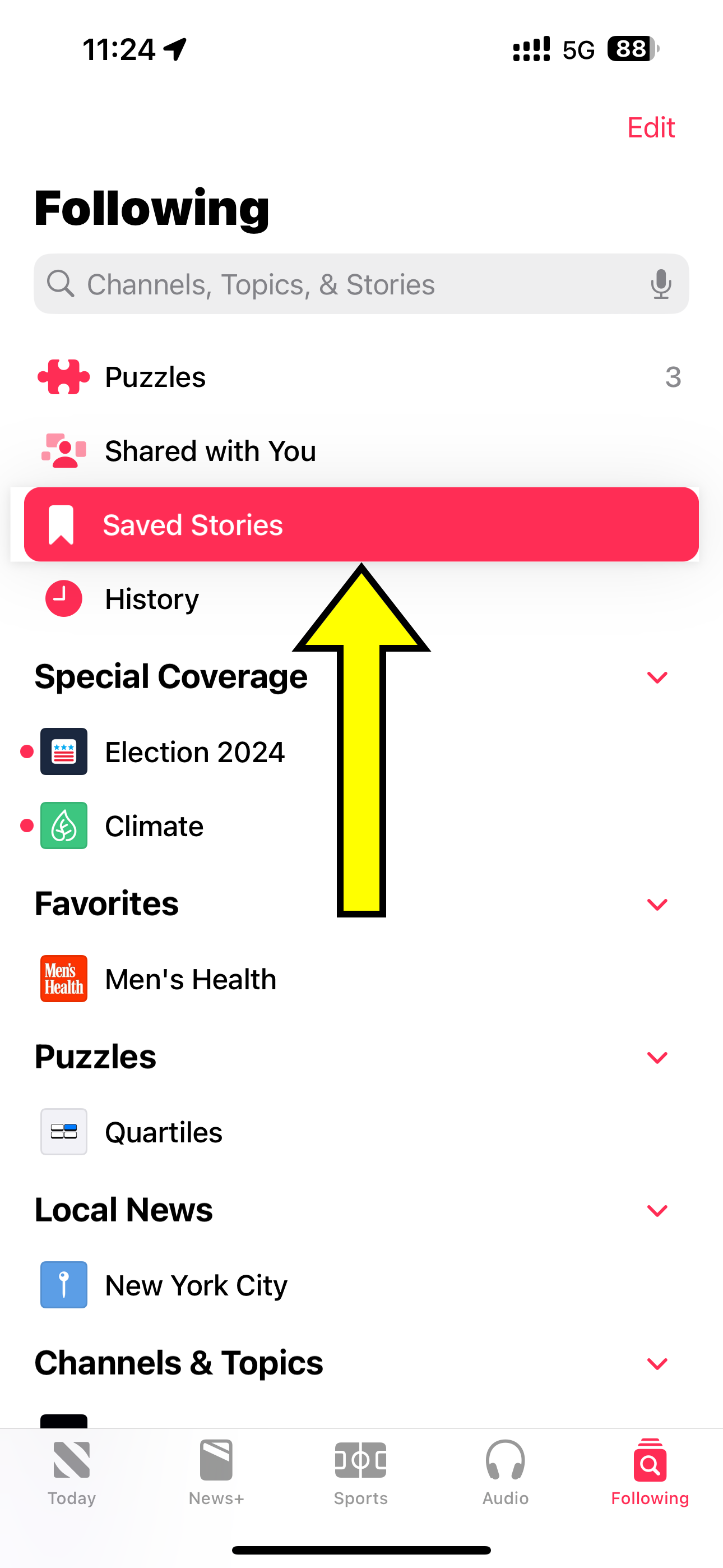 Apple News app on iPhone with the Saved Stories section selected.