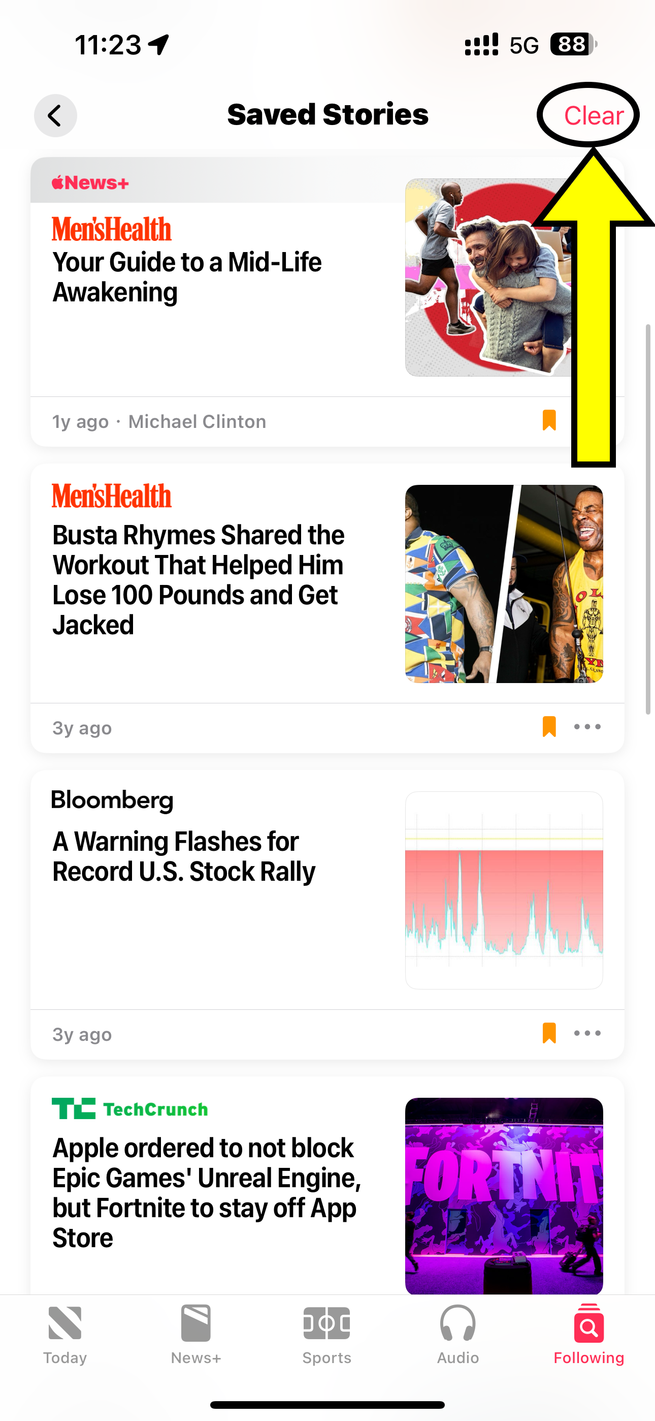 Apple News app on iPhone with the Clear button in the Saved Stories section highlighted..