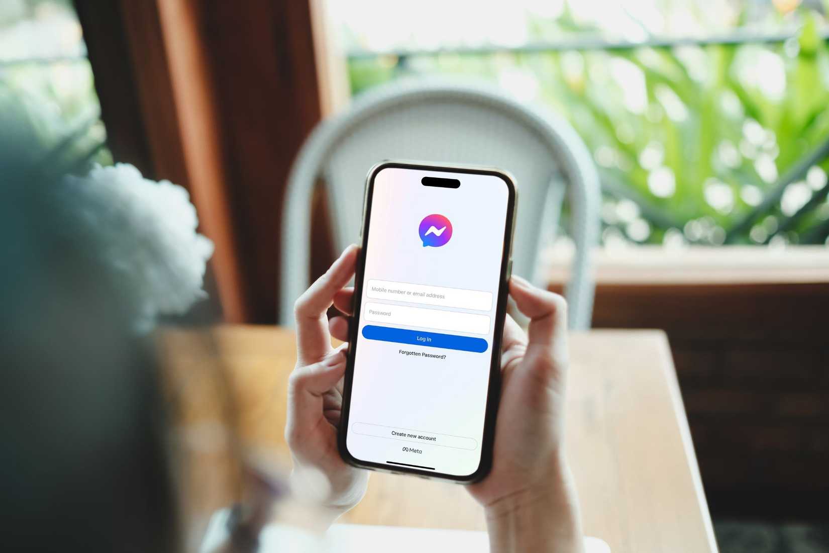 someone using the messenger app on a smartphone