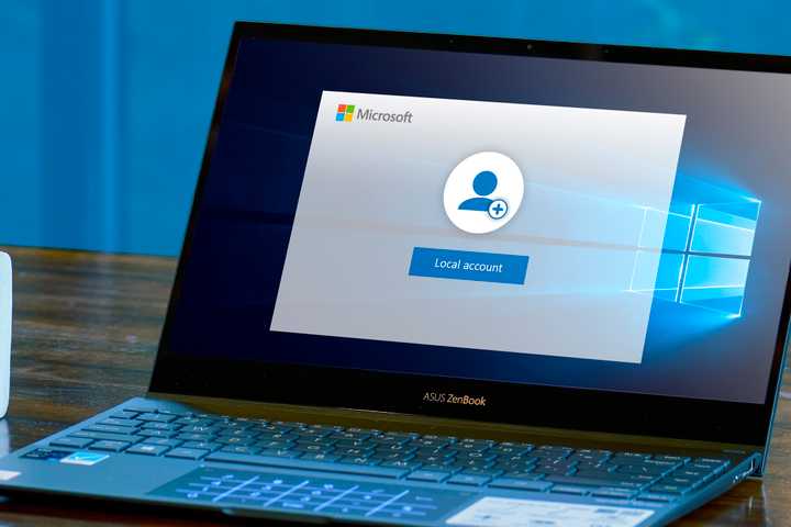 A Windows 10 Laptop with a 'Create a Local Account' screen.