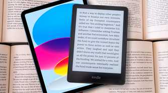 An iPad and a Kindle on top of some books.
