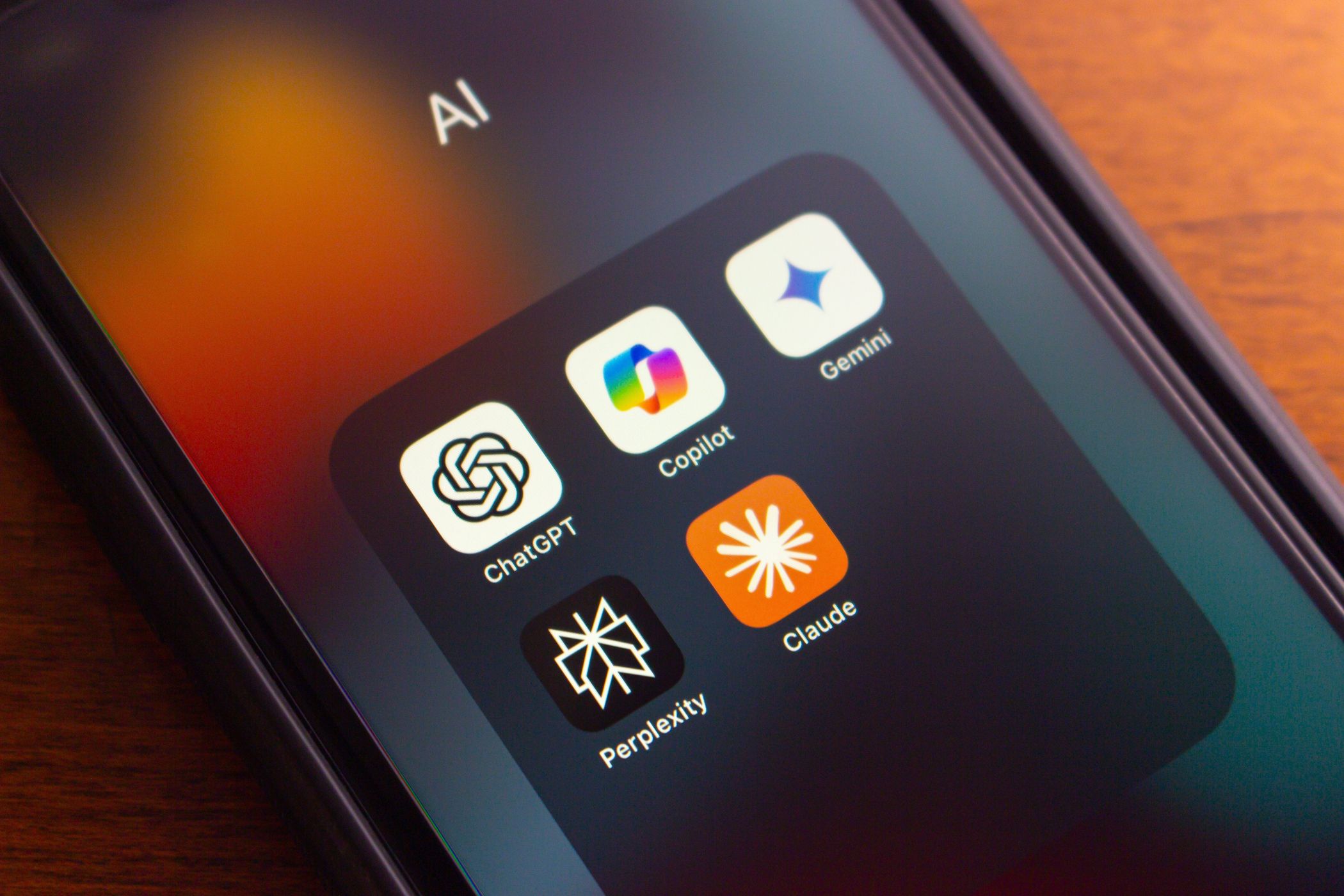 various ai chatbot app logos on smartphone screen