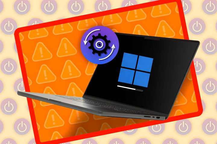 A laptop on the loading screen with the Windows and update logo