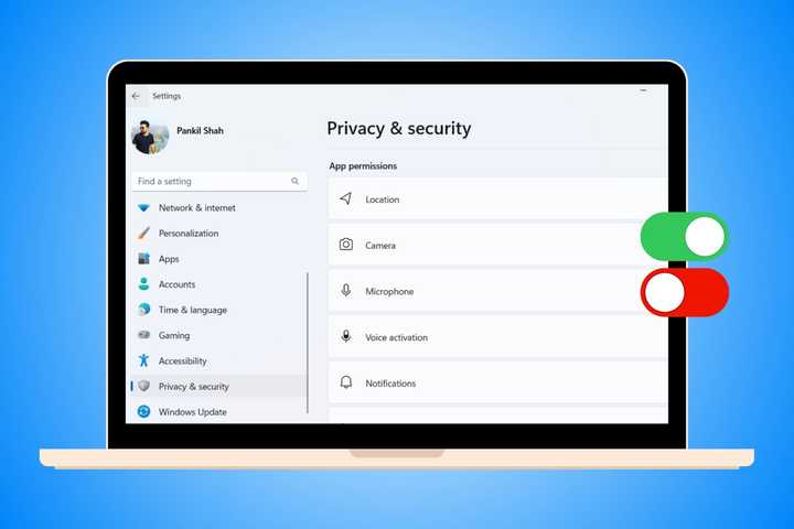 A laptop showing privacy and security menu in Windows Settings app with green and red toggles