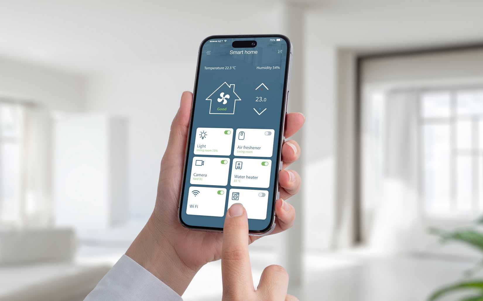 a man using an iPhone to control smart home devices