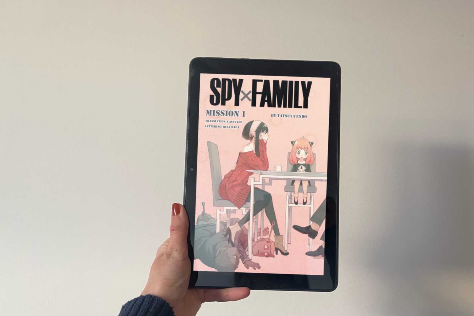 Kindle Fire Tablet showing the first chapter of the Spy x Family manga