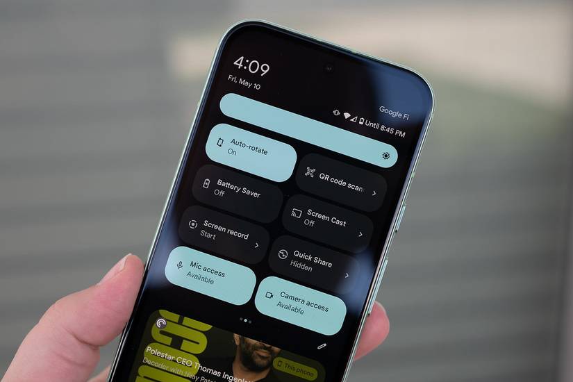 Person holding the Google Pixel 8a showing the quick setting