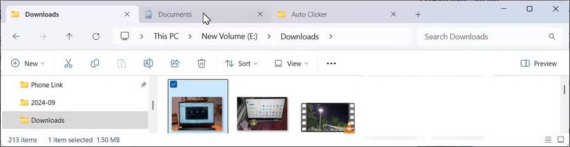 Windows 11 File Explorer with multiple tabs open