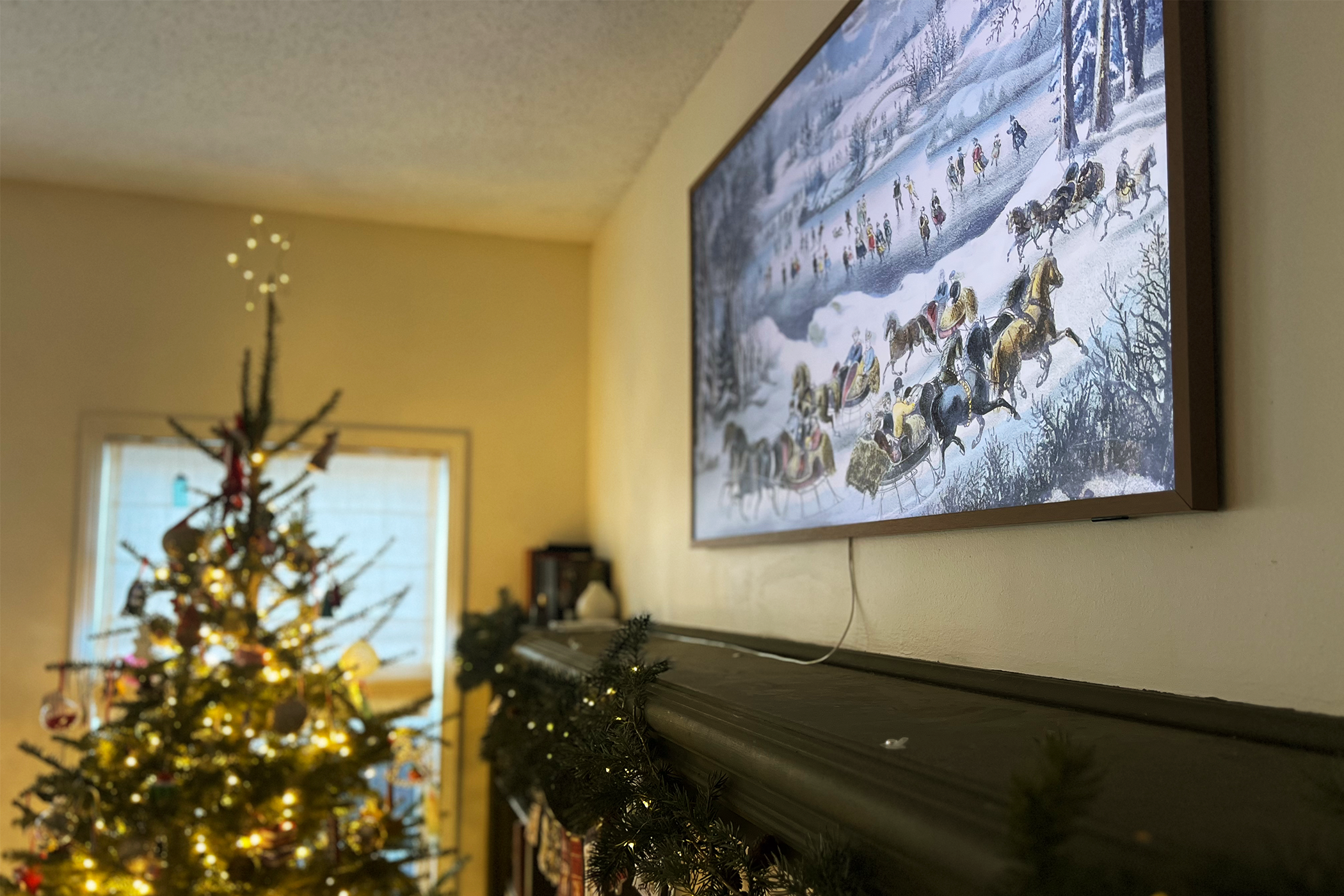 Frame TV On Wall Above Mantle