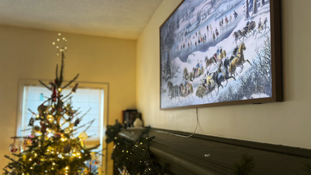 Frame TV On Wall Above Mantle