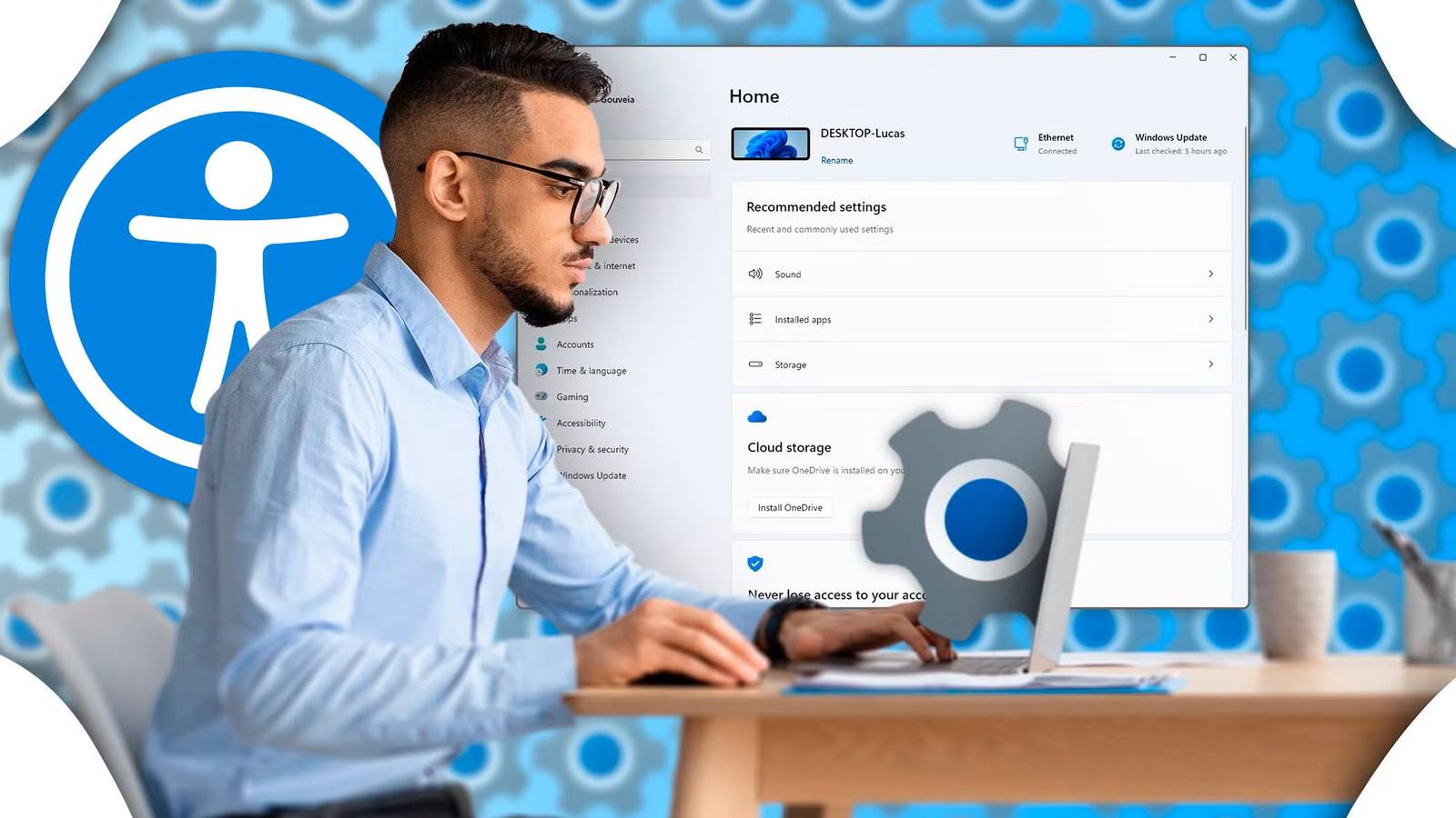 Man wearing glasses working on a laptop with accessibility icon in background
