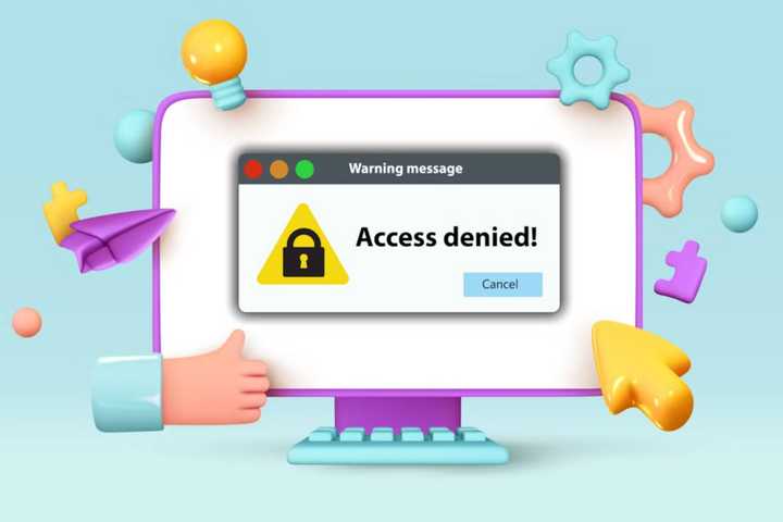 cartoon style computer with access denied warning message