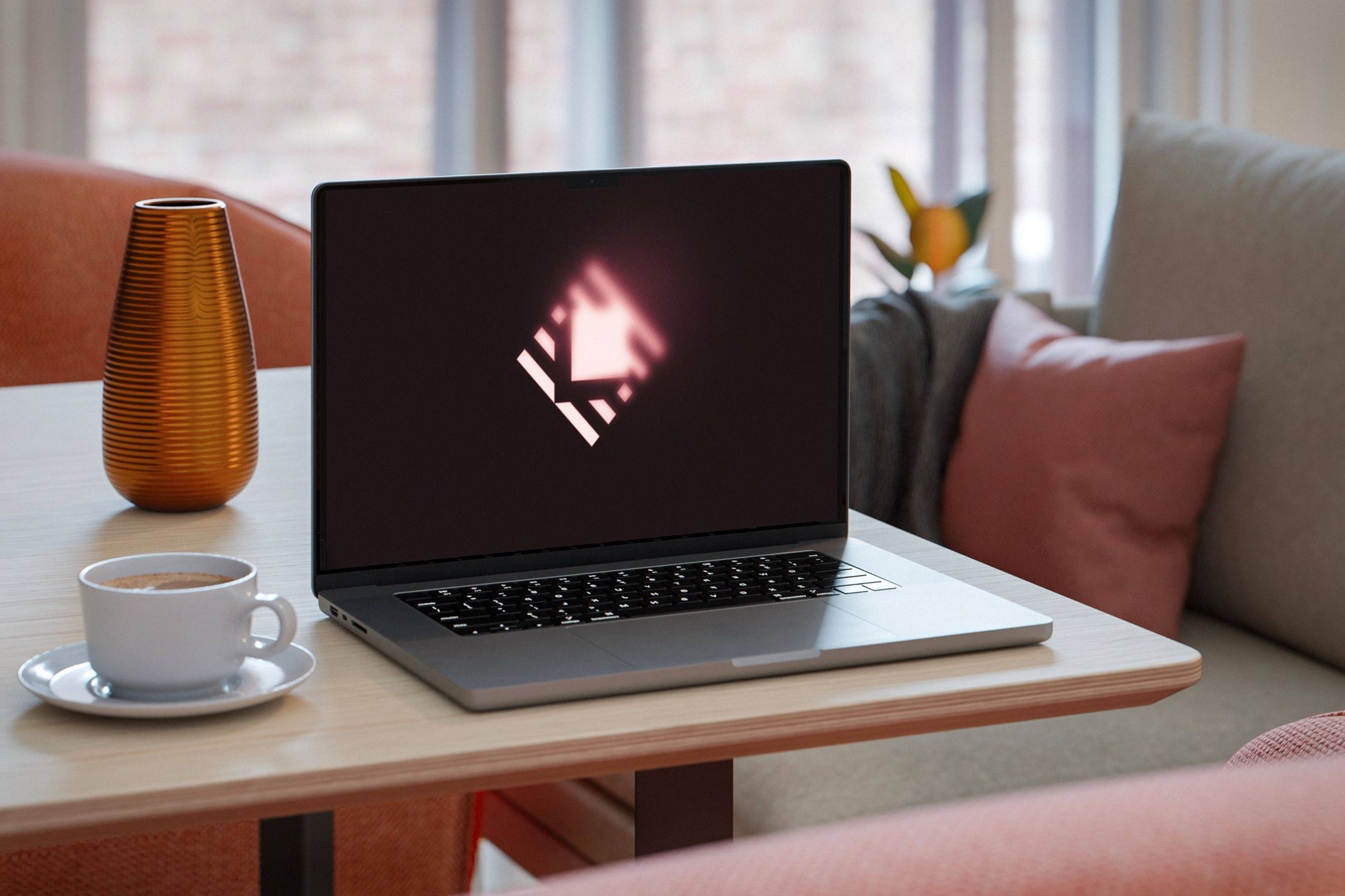 A Mac displaying the Raycast logo