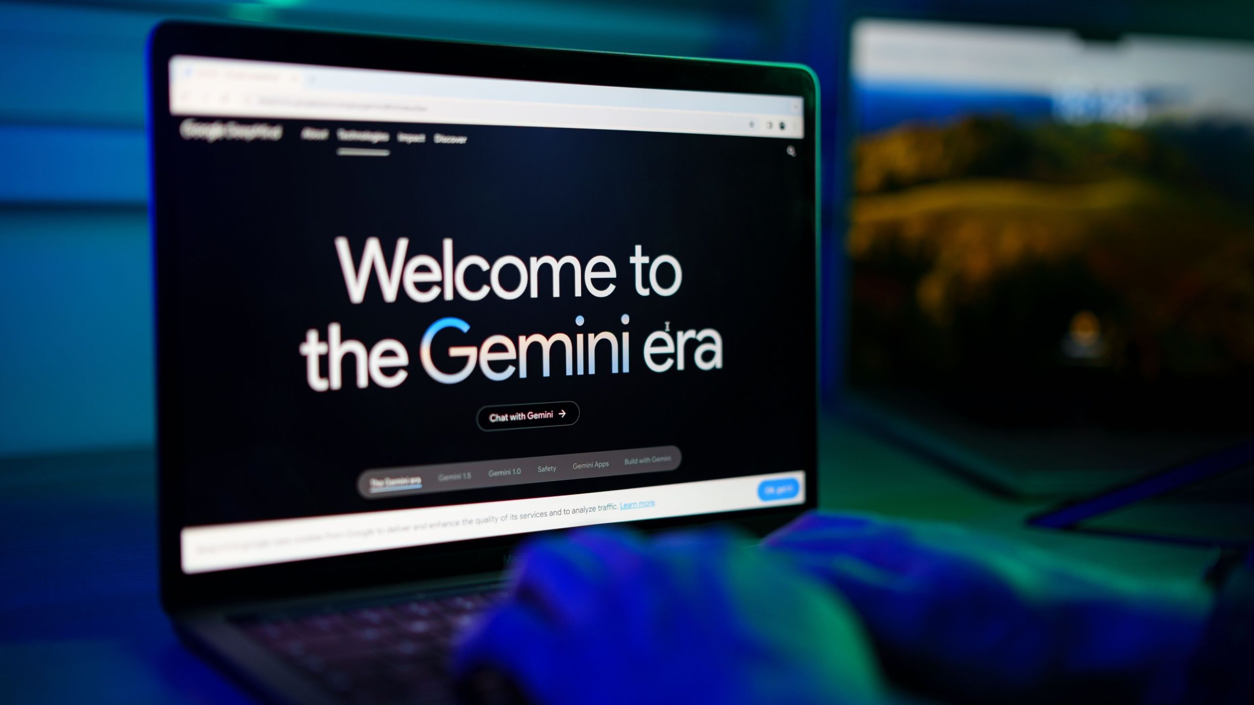 Welcome to the Gemini Era Text on a Laptop