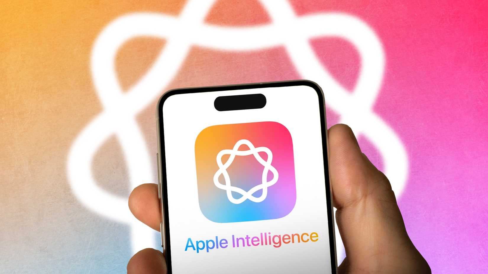 Apple Intelligence Logo and Text on Phone In Front of Logo
