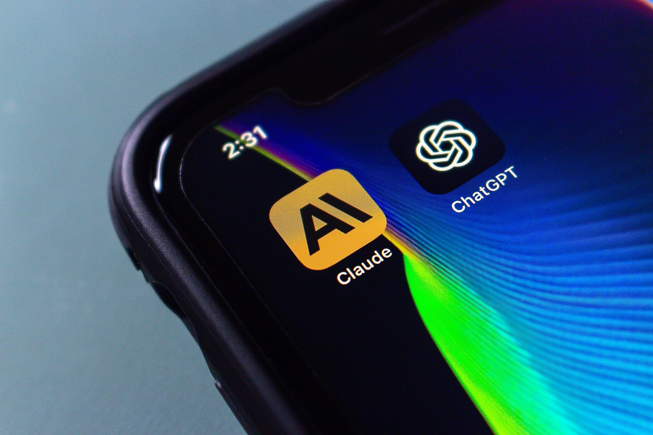 claude and chatgpt icons on smartphone screen.