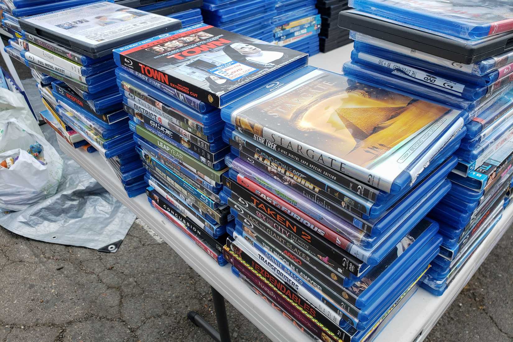 stacks of blu ray discs and boxes.