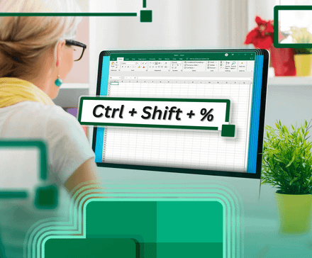a woman using excel on her pc with a shortcut in front.