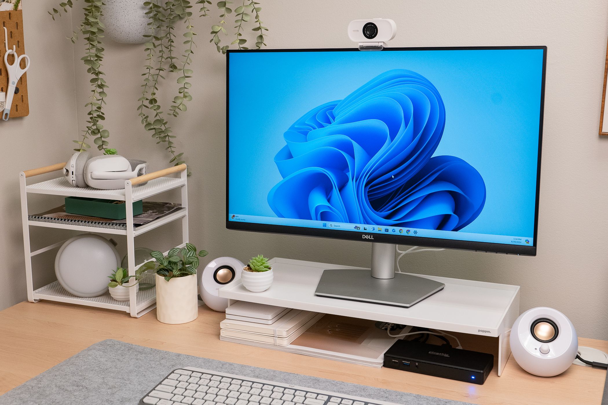 The Elgato Facecam Neo on top of a monitor