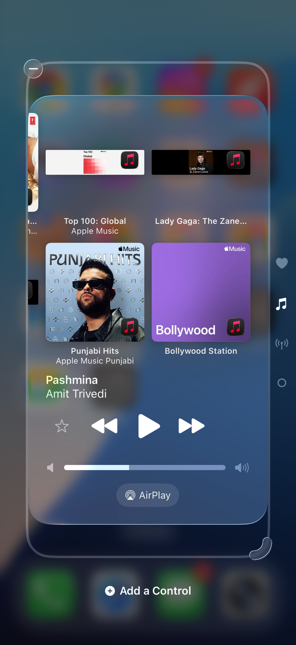 iPhone Control Center showing music widget