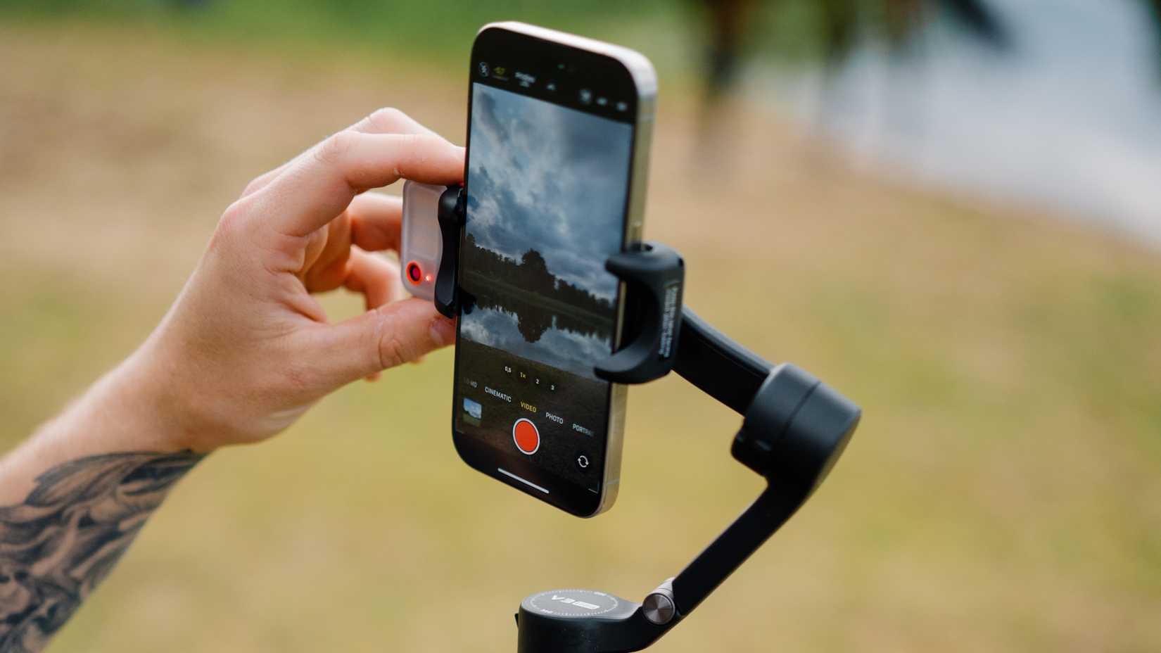 Hohem iSteady V3 Ultra holding iphone to capture video