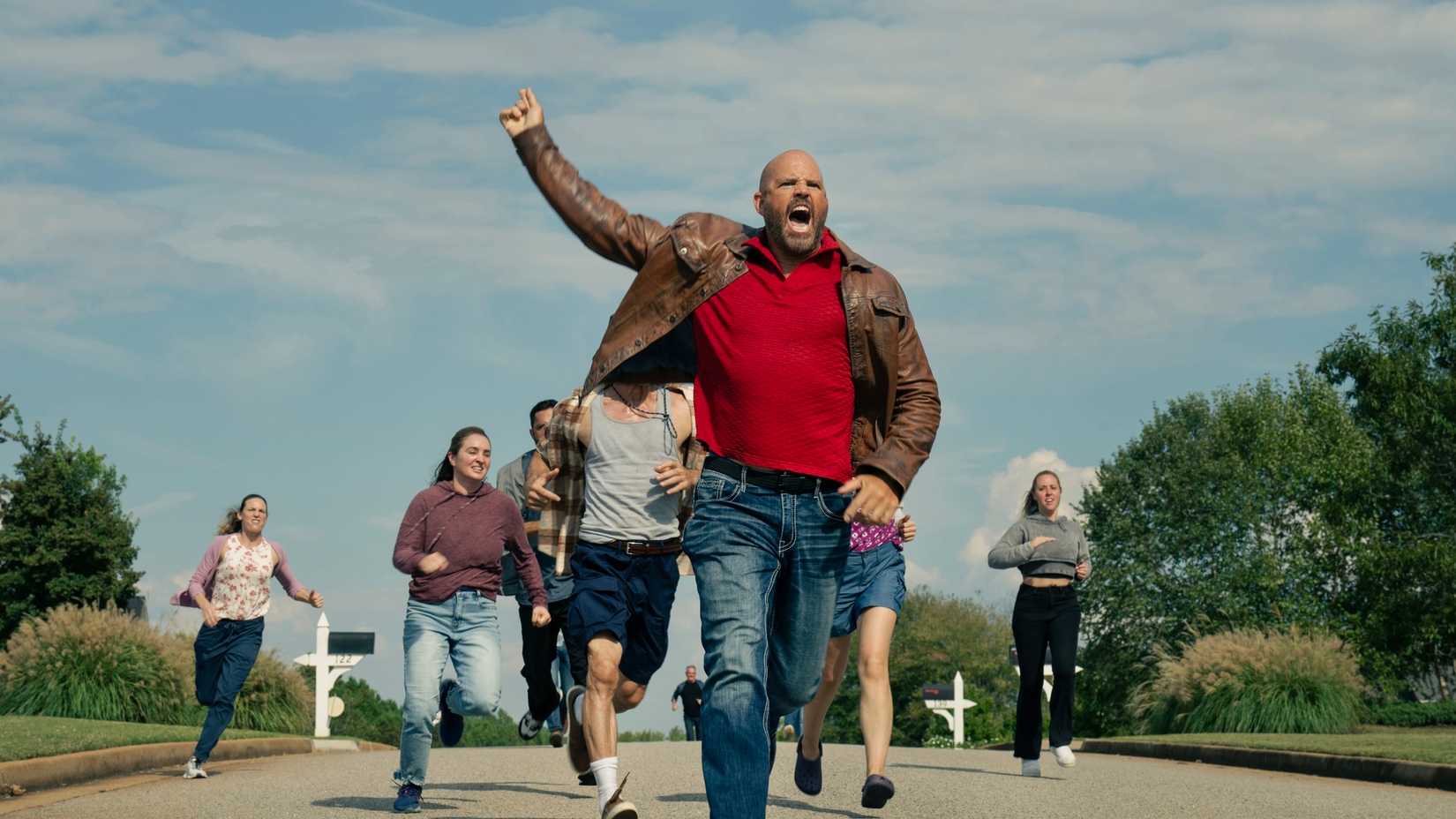 David Denman (Keith) with a mob in Peacemaker season 2 episode 7