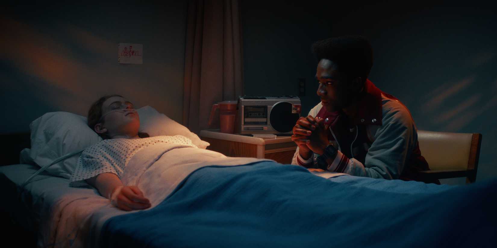 Lucas by Max's bedside in Stranger Things season 5