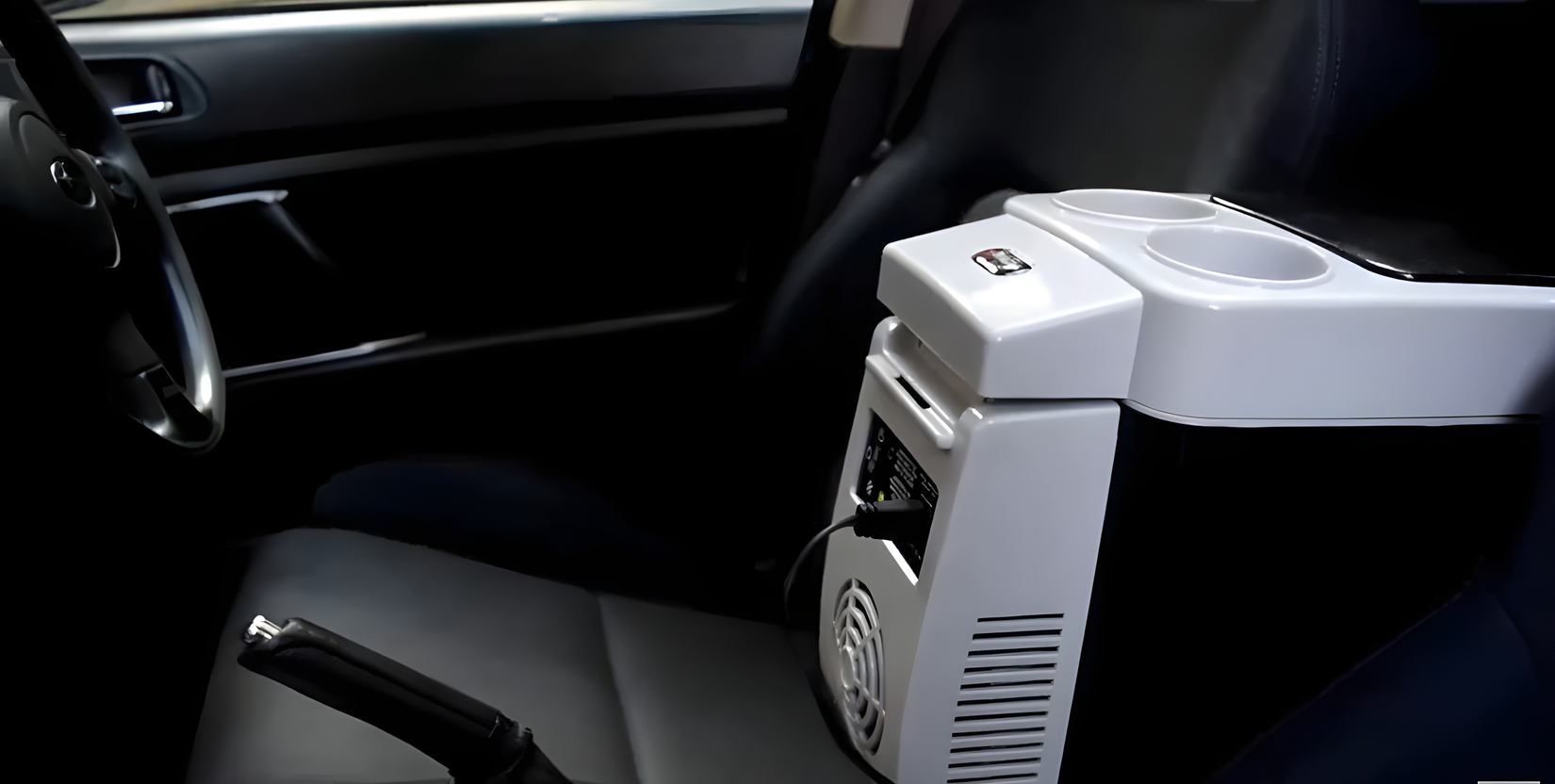 A portable thermoelectric cooler plugged into a car 12V port.