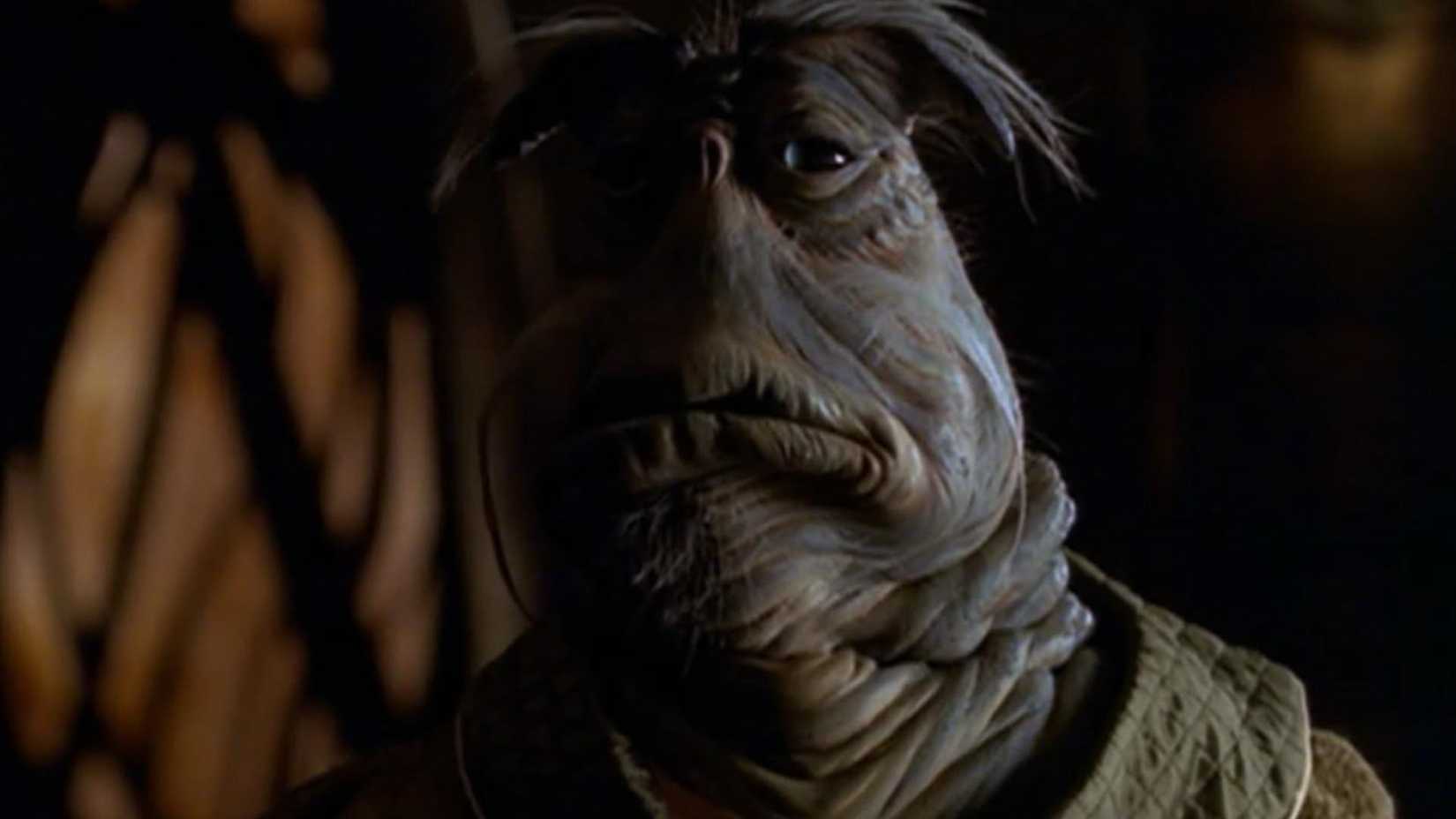 Rygel from Farscape looking thoughtful.