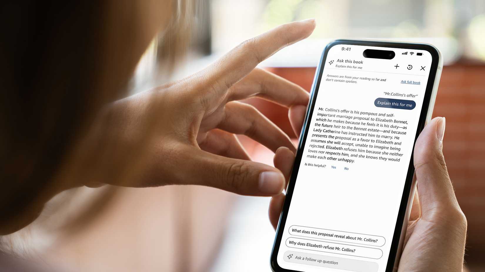 Aplicación Kindle iOS que muestra la función de explicación Ask This Book AI.
