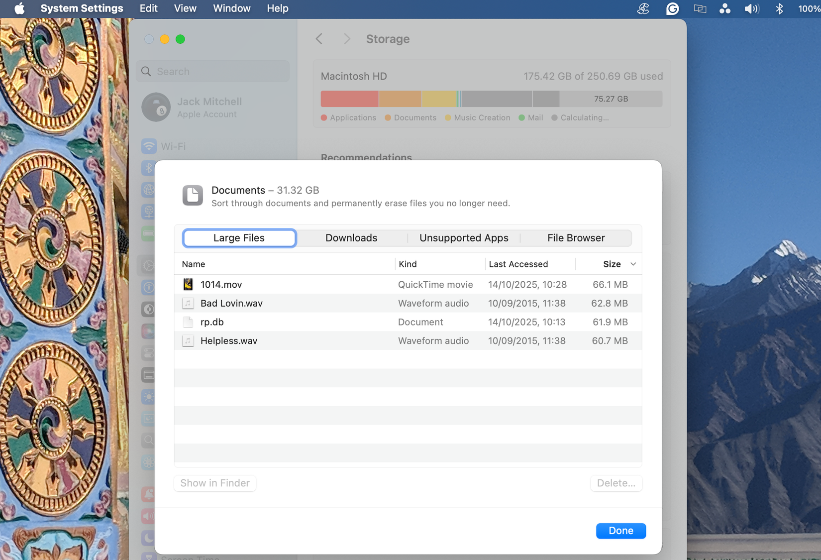 Clear large files via Mac's Storage panel.