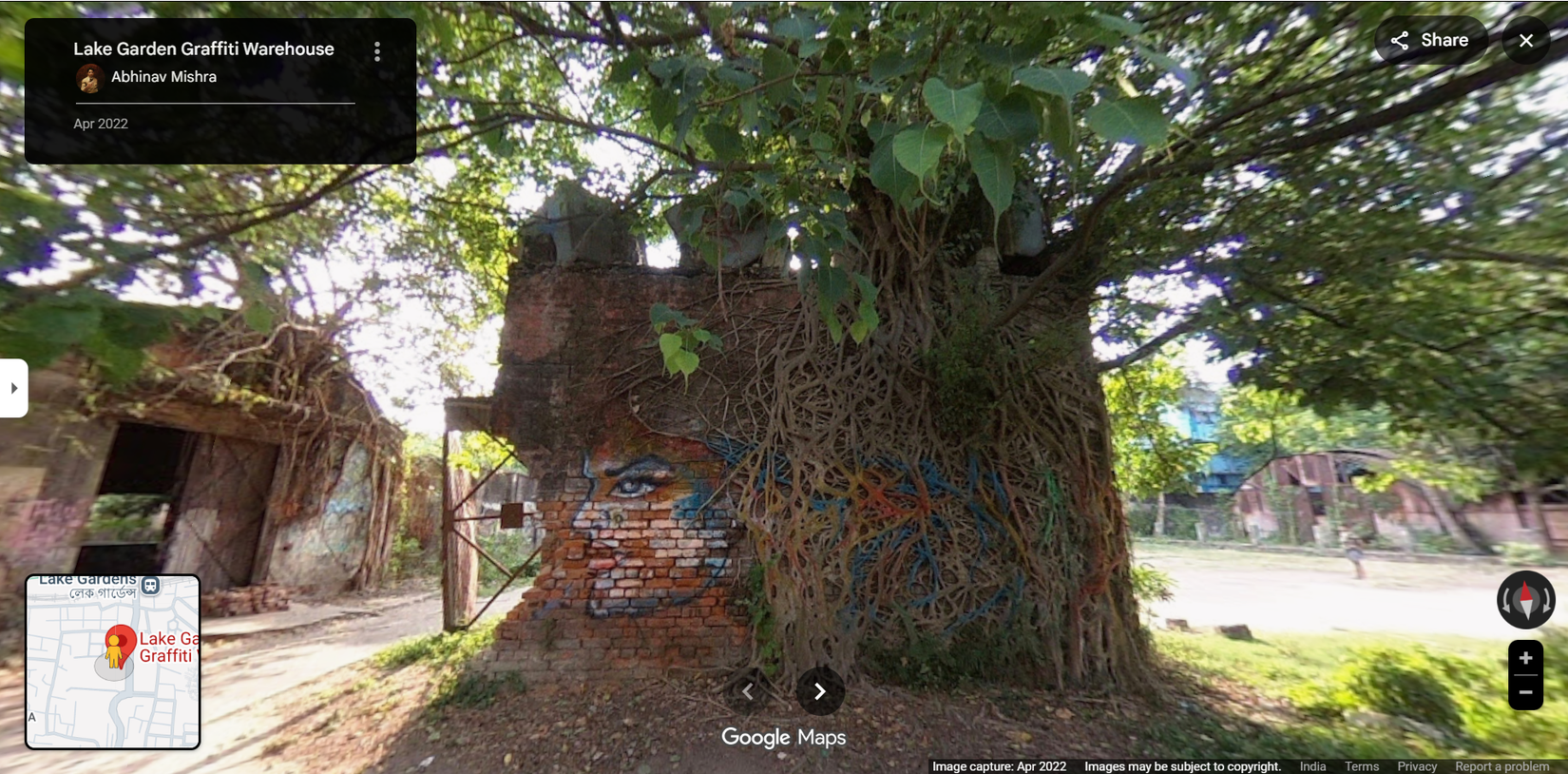 Google Street View showing a mural on a city street.